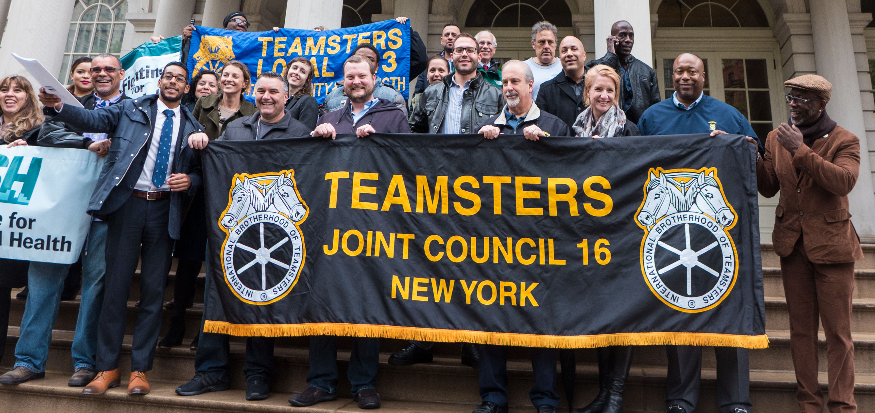 Councilmembers and Teamsters at press conference